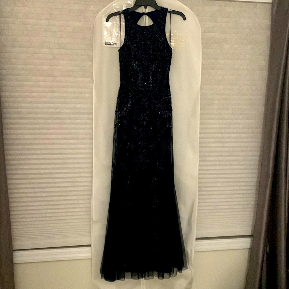 Beautiful, navy mother of the bride gown bought from Sara‘s bridal boutique.